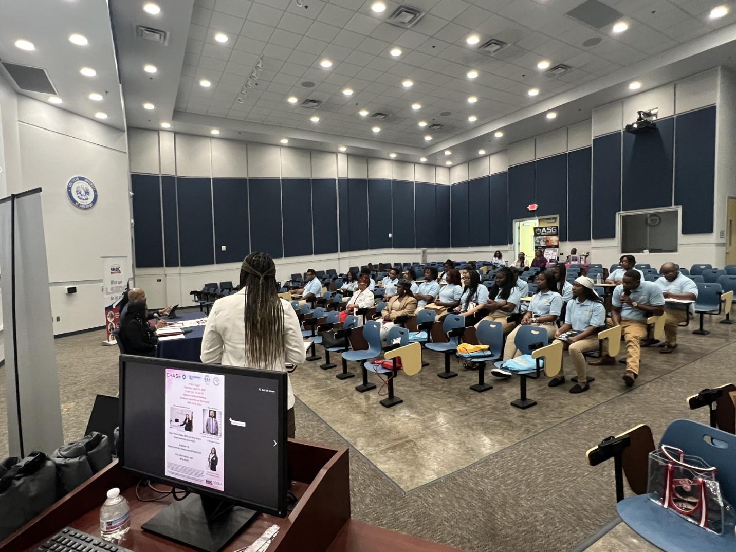 CEO Speaking to crowd inspiring SUSLA Students